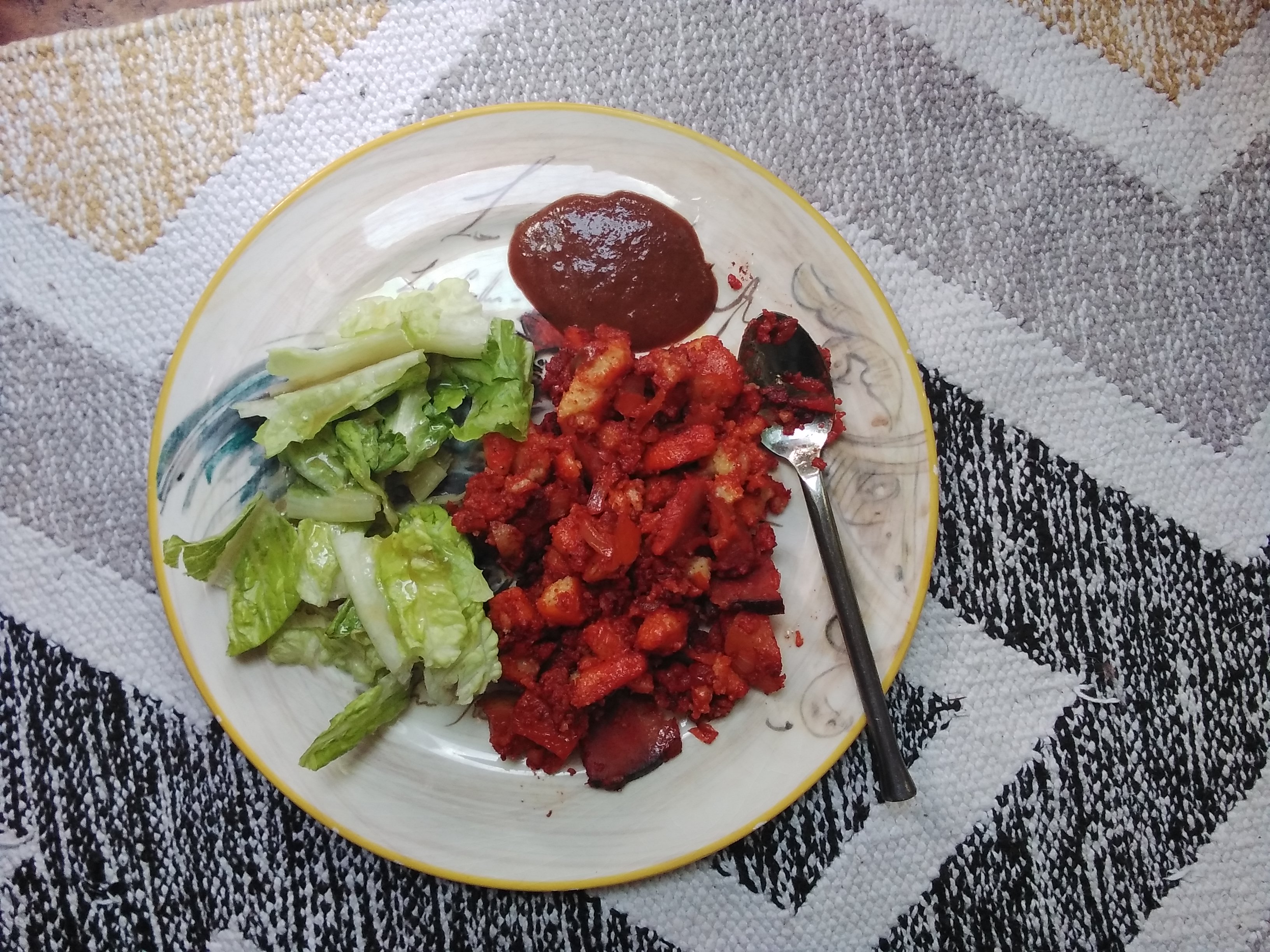 Polenta, tikka masala sauce, suppper,salad,lettuce Polenta, tikka masala sauce, suppper,salad,lettuce