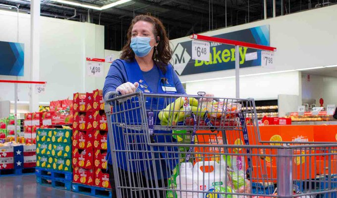 A customer at Sam's Club taking precautions due to the virus A customer at Sam's Club taking precautions due to the virus