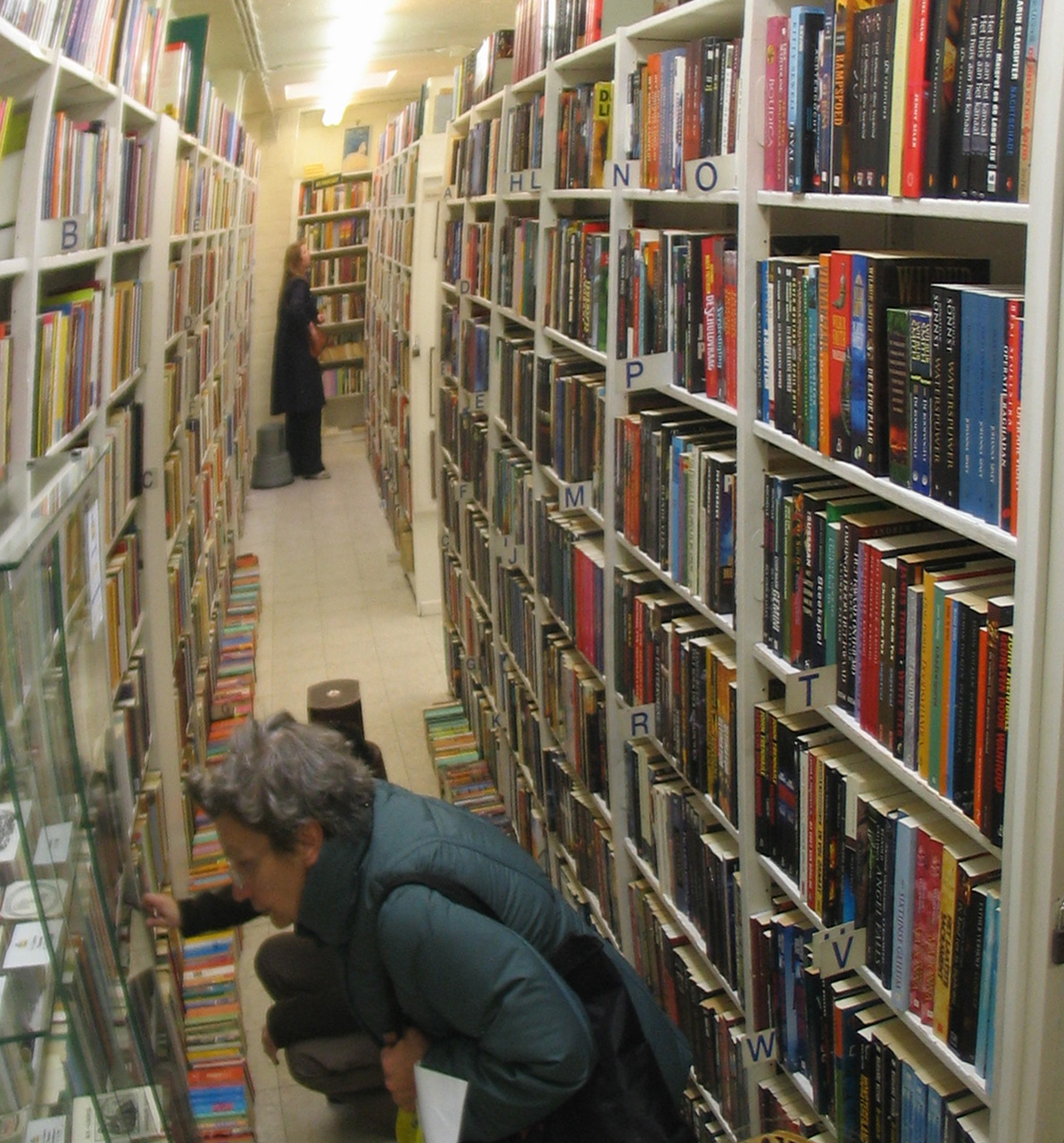 A customer of Herman looks hard for a book that was no longer there for now A customer of Herman looks hard for a book that was no longer there for now