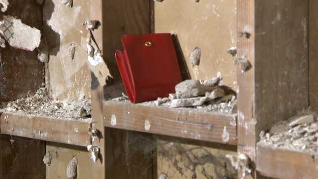 A missing wallet found inside a theater after near six decades A missing wallet found inside a theater after near six decades