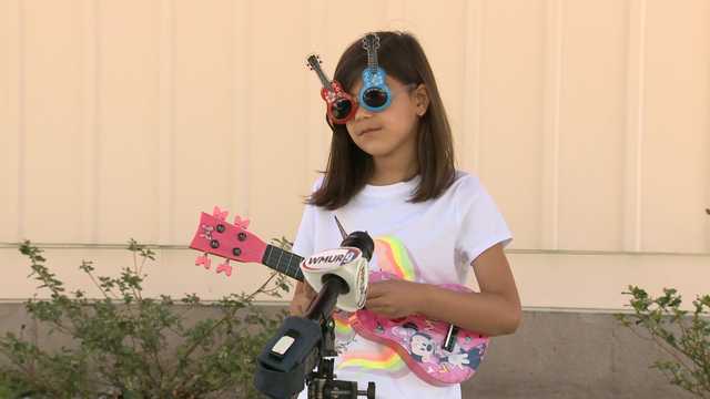Seven year old ukulele player Lilyana Roman Seven year old ukulele player Lilyana Roman