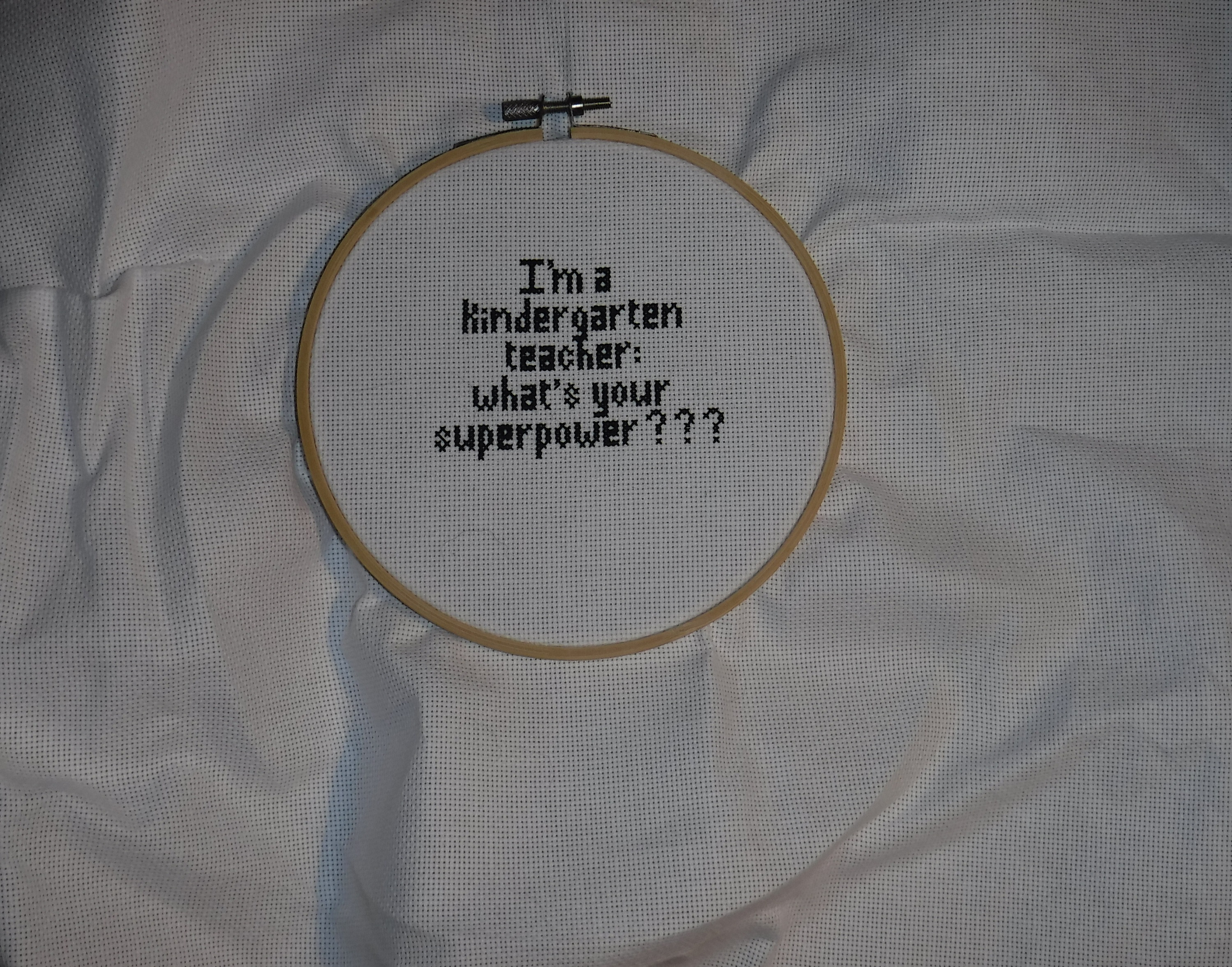 Photo I took of the cross stitch I'm working on in a new hoop Photo I took of the cross stitch I'm working on in a new hoop
