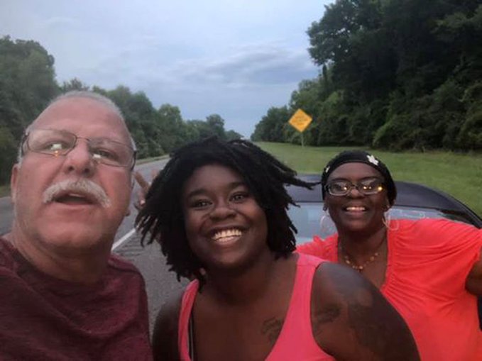 Tim Borel and the two women he assisted in getting a flat tire fixed