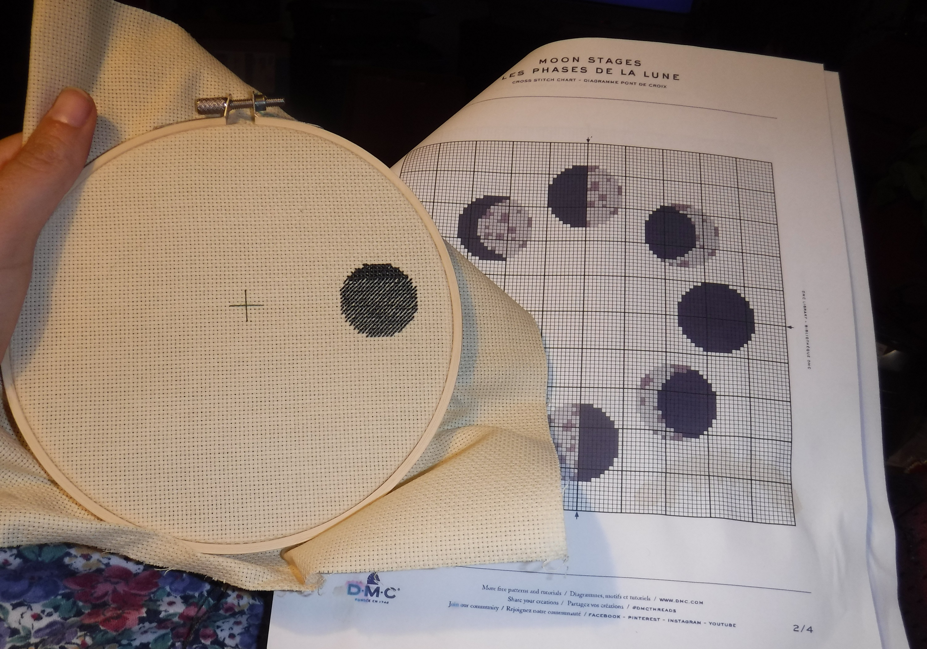 Photo I took of the cross stitch I'm working on and the pattern Photo I took of the cross stitch I'm working on and the pattern