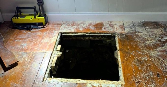 A broken floor inside of a home in Guilford Connecticut