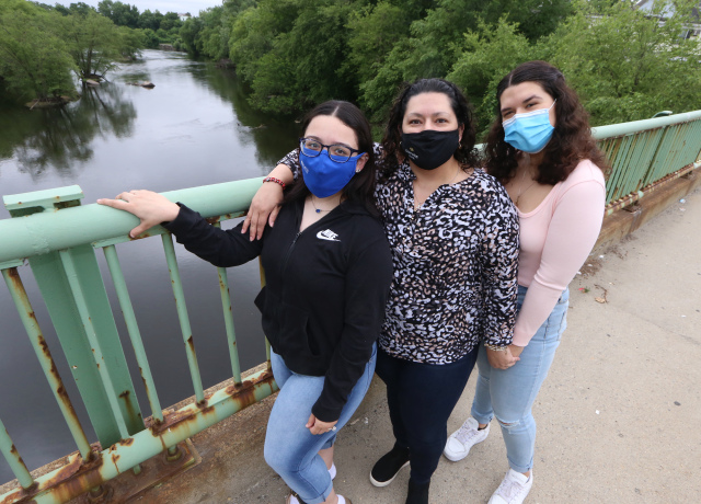 Francis Gonzalez and her two daughters at a bridge in Lowell Francis Gonzalez and her two daughters at a bridge in Lowell