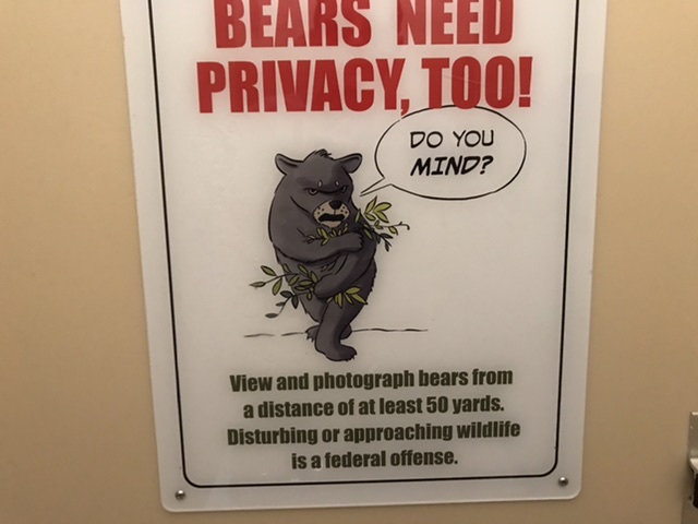 Humorous sign reminding visitors to keep their distance from wildlife. Photo taken by and the property of FourWalls. Humorous sign reminding visitors to keep their distance from wildlife. Photo taken by and the property of FourWalls.