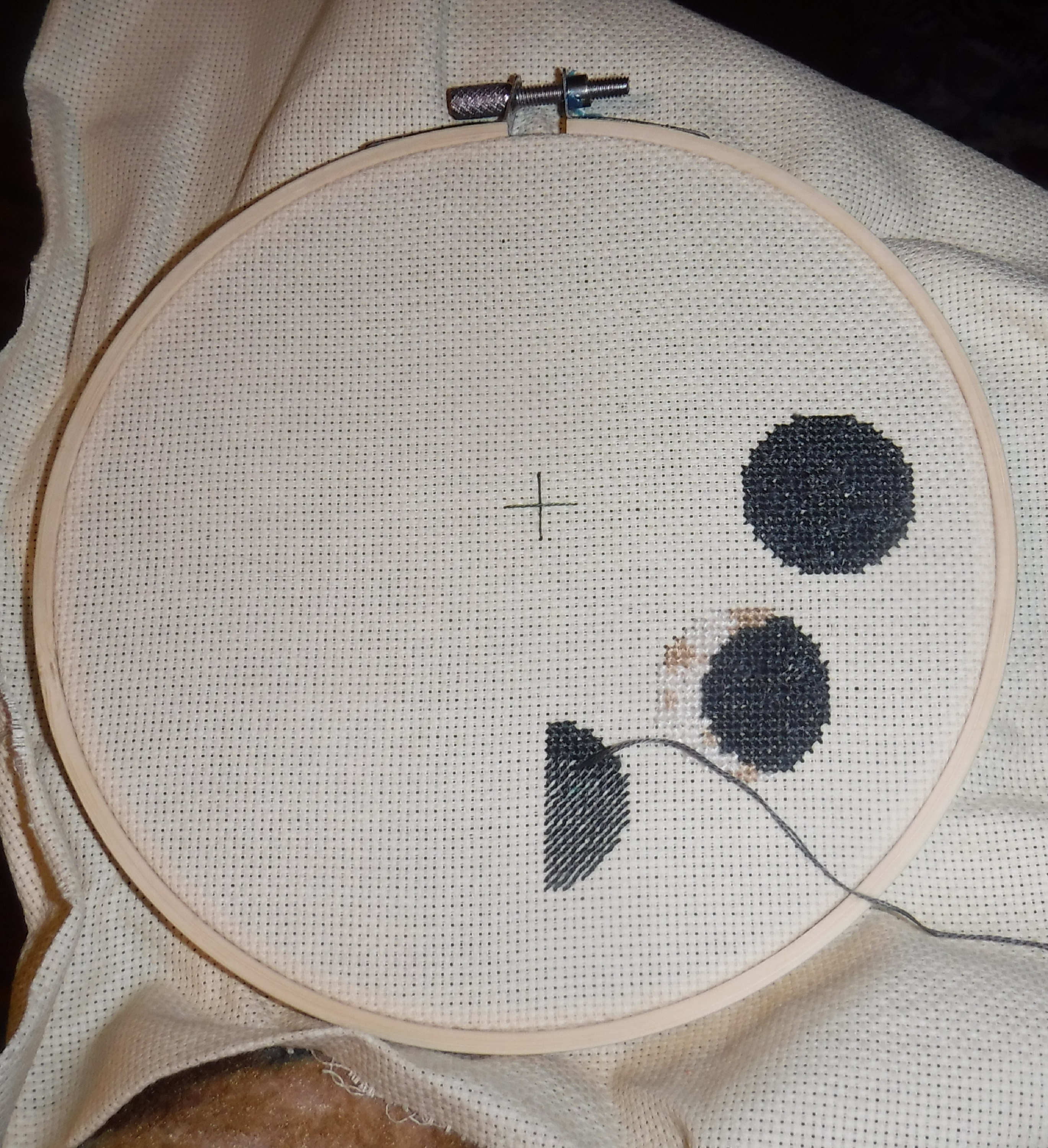 Photo I took of my current progress on the cross stitch I'm working on. Photo I took of my current progress on the cross stitch I'm working on.