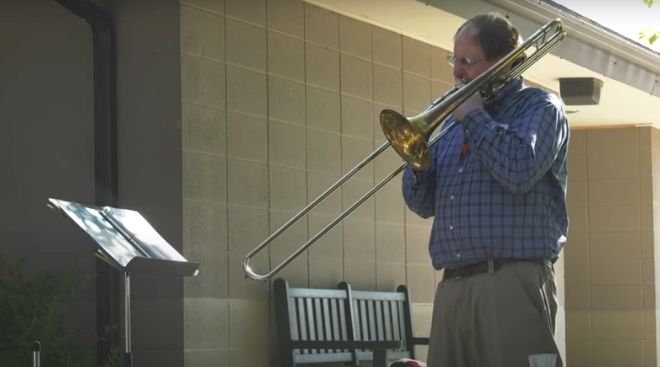 Robert Graham playing the trombone since music uplifts spirits Robert Graham playing the trombone since music uplifts spirits