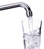 glass of water - filling a glass of water from a tap