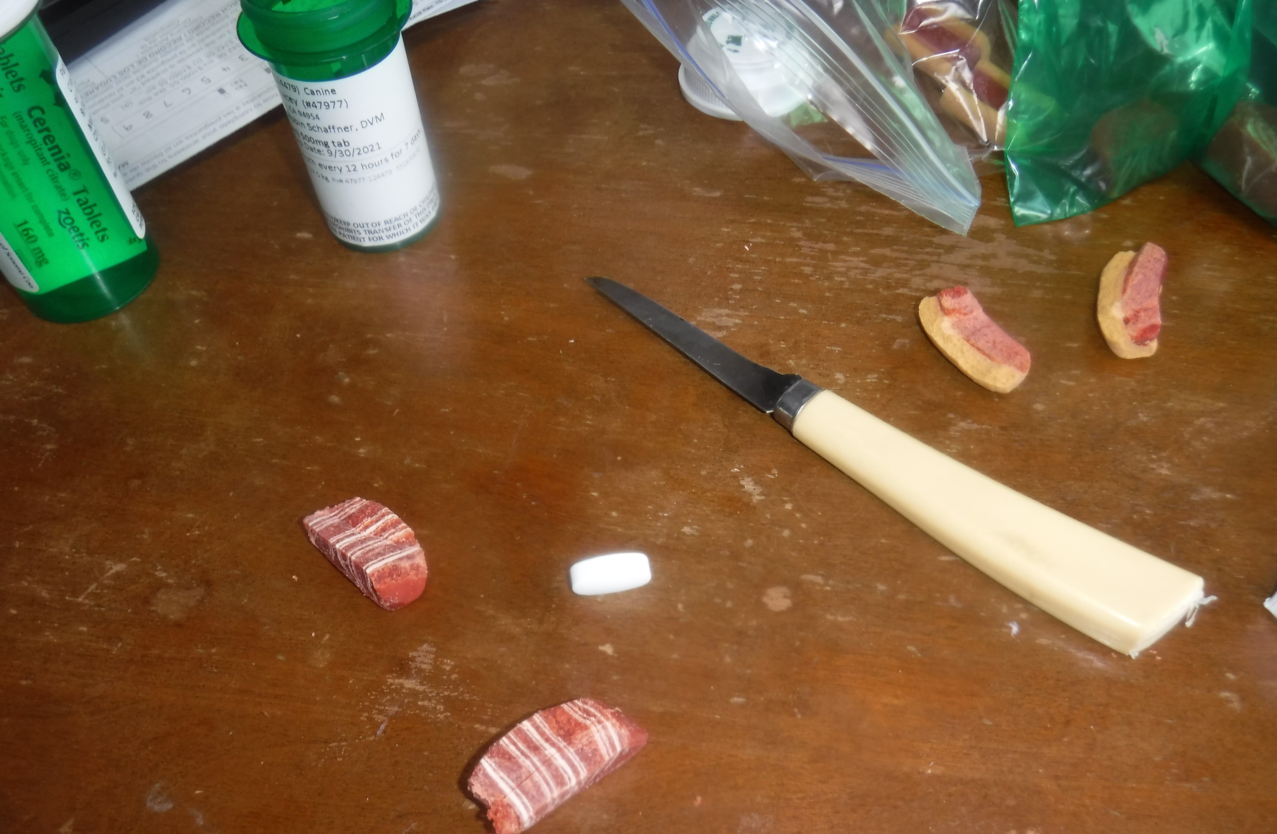Photo I took of the treats I was trying to cut a slit in so I could hide Angel's pills Photo I took of the treats I was trying to cut a slit in so I could hide Angel's pills