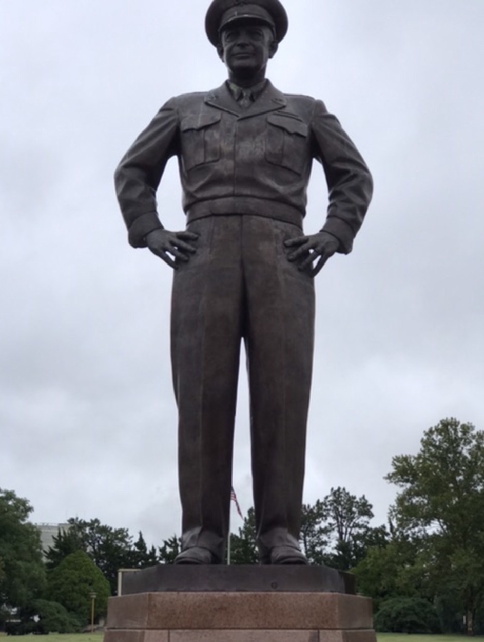 Statue of General Eisenhower on the grounds of the Eisenhower Museum, Library, and Boyhood Home. Photo taken by and the property of FourWalls. Statue of General Eisenhower on the grounds of the Eisenhower Museum, Library, and Boyhood Home. Photo taken by and the property of FourWalls.