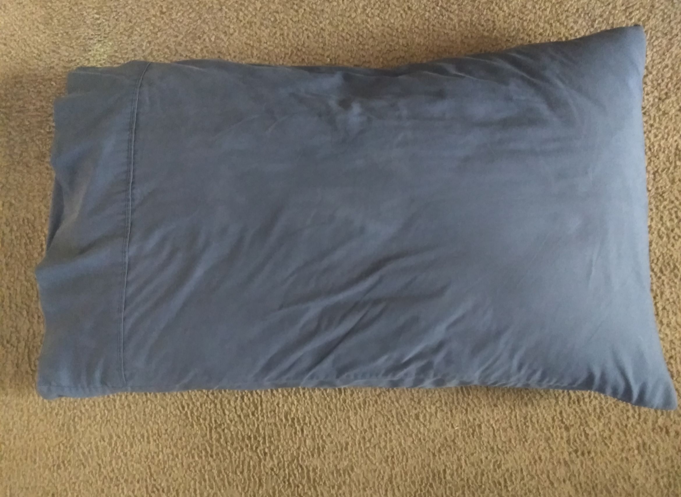 Sure enough the pillowcase was still there on the pillow. Sure enough the pillowcase was still there on the pillow.