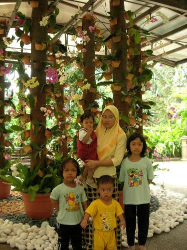 Orchid Garden - This me, my baby and my husband cousin at Kuala Lumpur Orchid Garden. The garden is open everyday except on Monday.