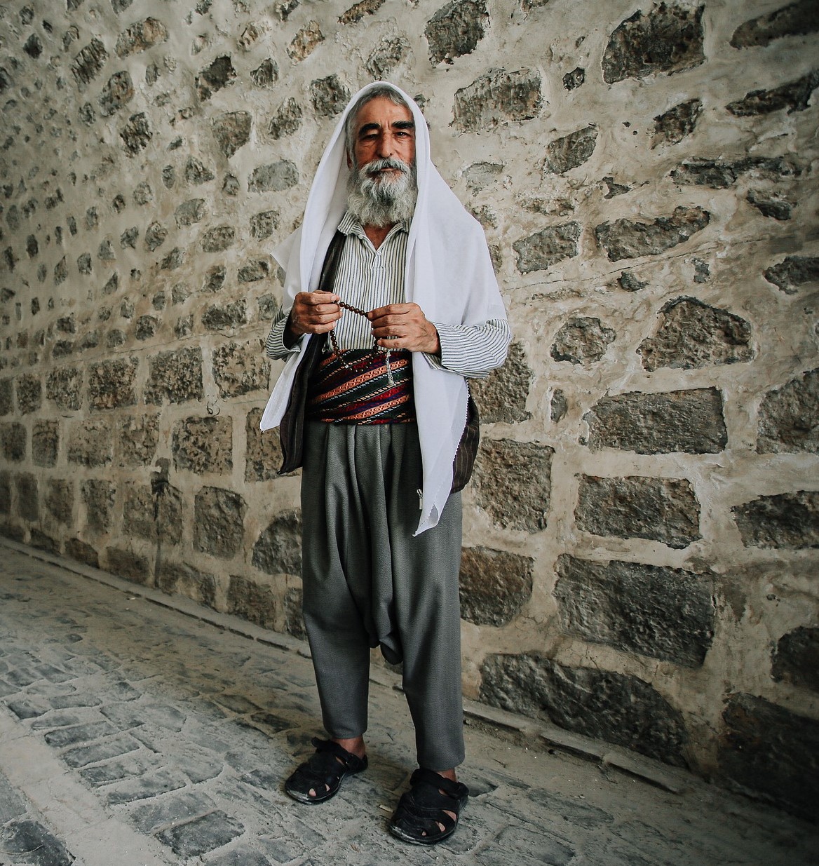 The Mullah in his traditional dress ready to begin his morning session