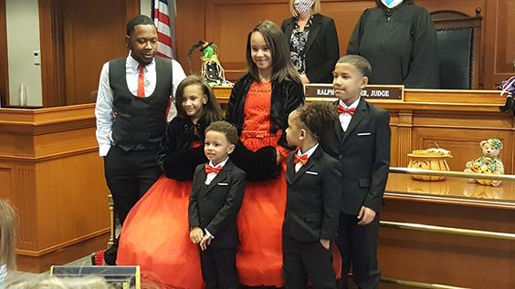 Single dad Robert Carter and his five children that he adopted Single dad Robert Carter and his five children that he adopted