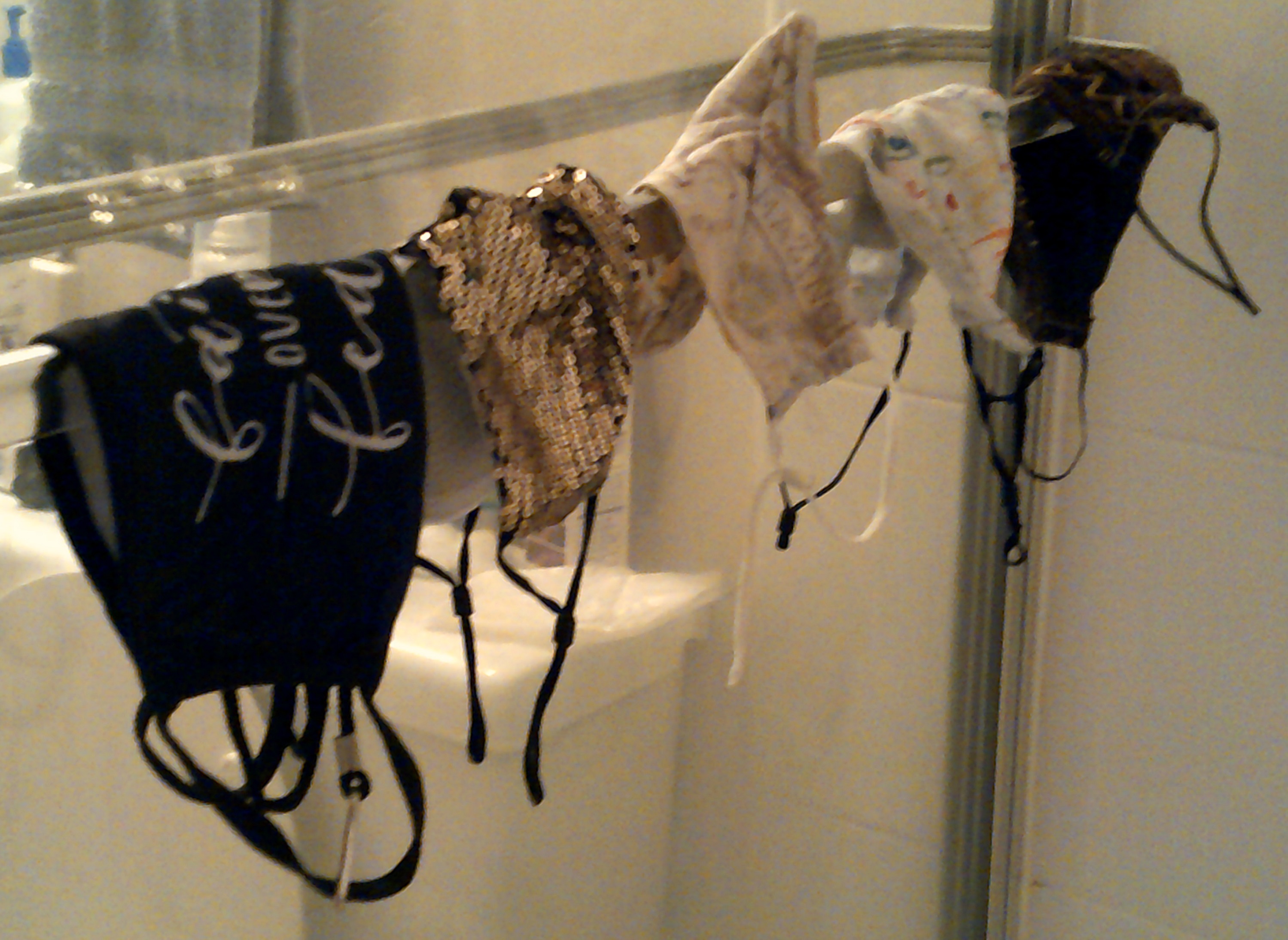 Photo I took of the masks I washed drying in the shower.