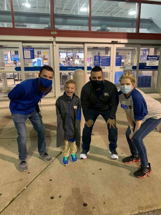 Employees at a Fort Wayne Indiana store with Parker Buchholz
