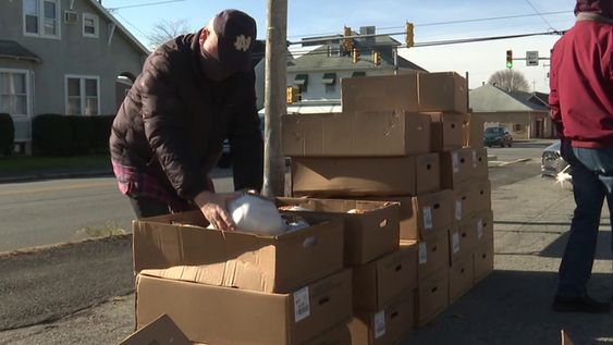 Members of the National Elks Club assisting the needy