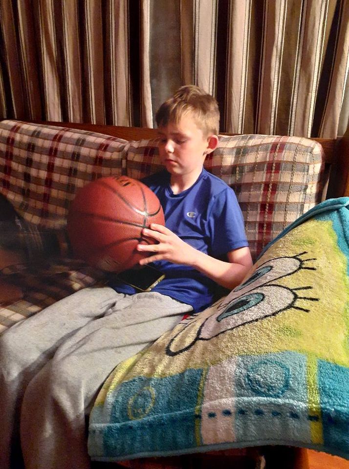Elijah Wheeler at home with his new basketball gift in Ohio Elijah Wheeler at home with his new basketball gift in Ohio