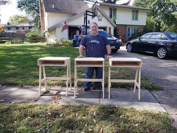 New Jersey resident Justin Foley with his desk work for students New Jersey resident Justin Foley with his desk work for students