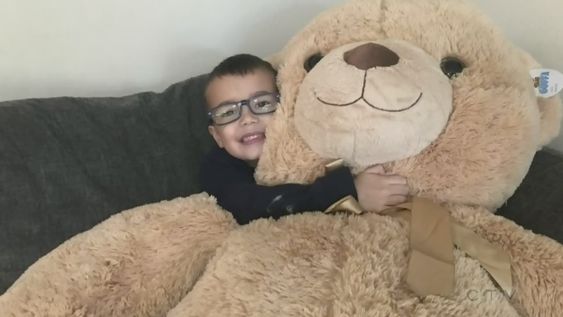 Four year old Doug and his teddy bear at his home in Canada. Four year old Doug and his teddy bear at his home in Canada.