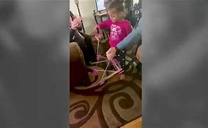 Nina Saleh with her new baby stroller than was purchased by a police officer