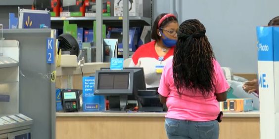 A cashier at a Wal Mart store in Canton Mississippi A cashier at a Wal Mart store in Canton Mississippi