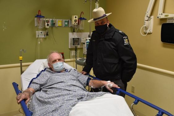 New York State Trooper Cawley and Kevin Kresen in a hospital