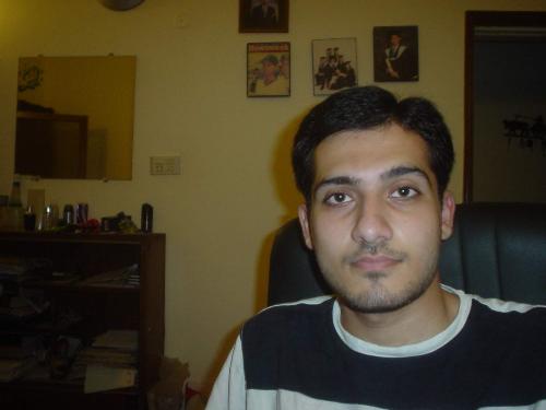 sitting in the room - This is the picture i have taken myself while using computer according to my friends and family members iam looking in this photo lolzzzzzzzzzz
