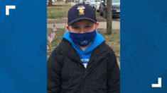 Eight year old boy Max T supports the Toledo Police with a cocoa stand
