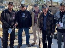 Members of war veterans in San Antonio working on a home project Members of war veterans in San Antonio working on a home project