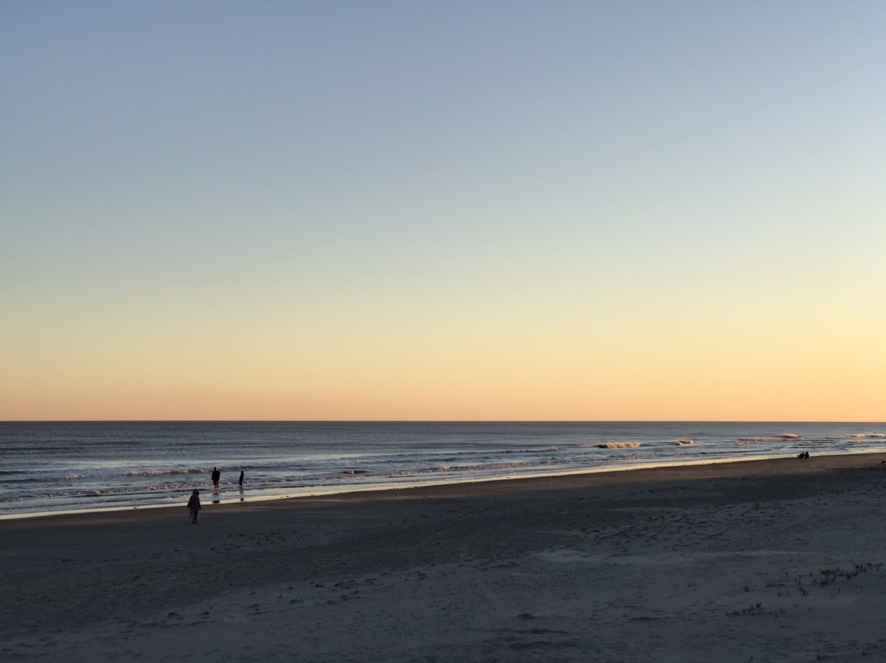 Galveston Beach at sunset.  Photo taken by and the property of FourWalls.