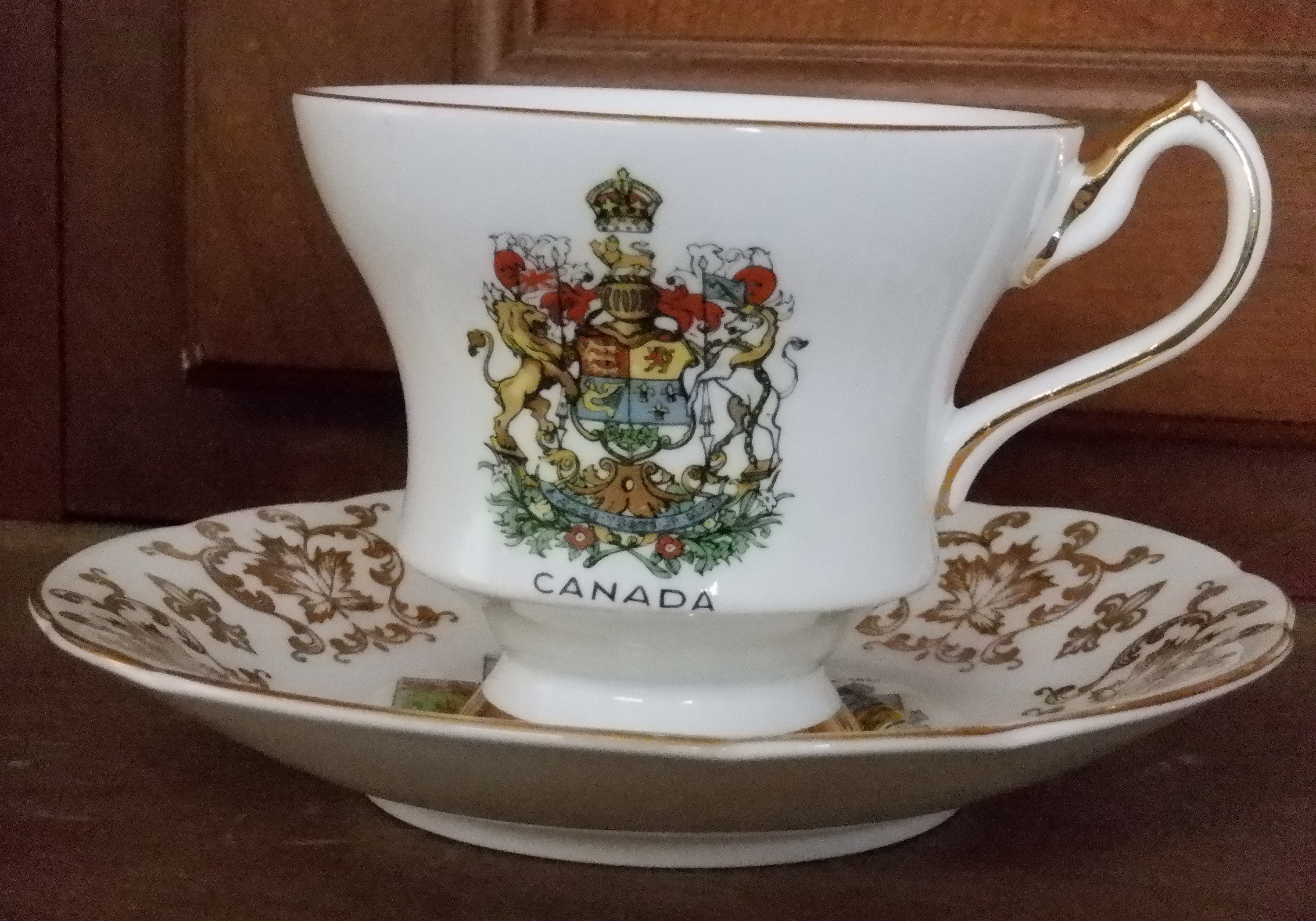 Tea cup and not matching saucer Tea cup and not matching saucer