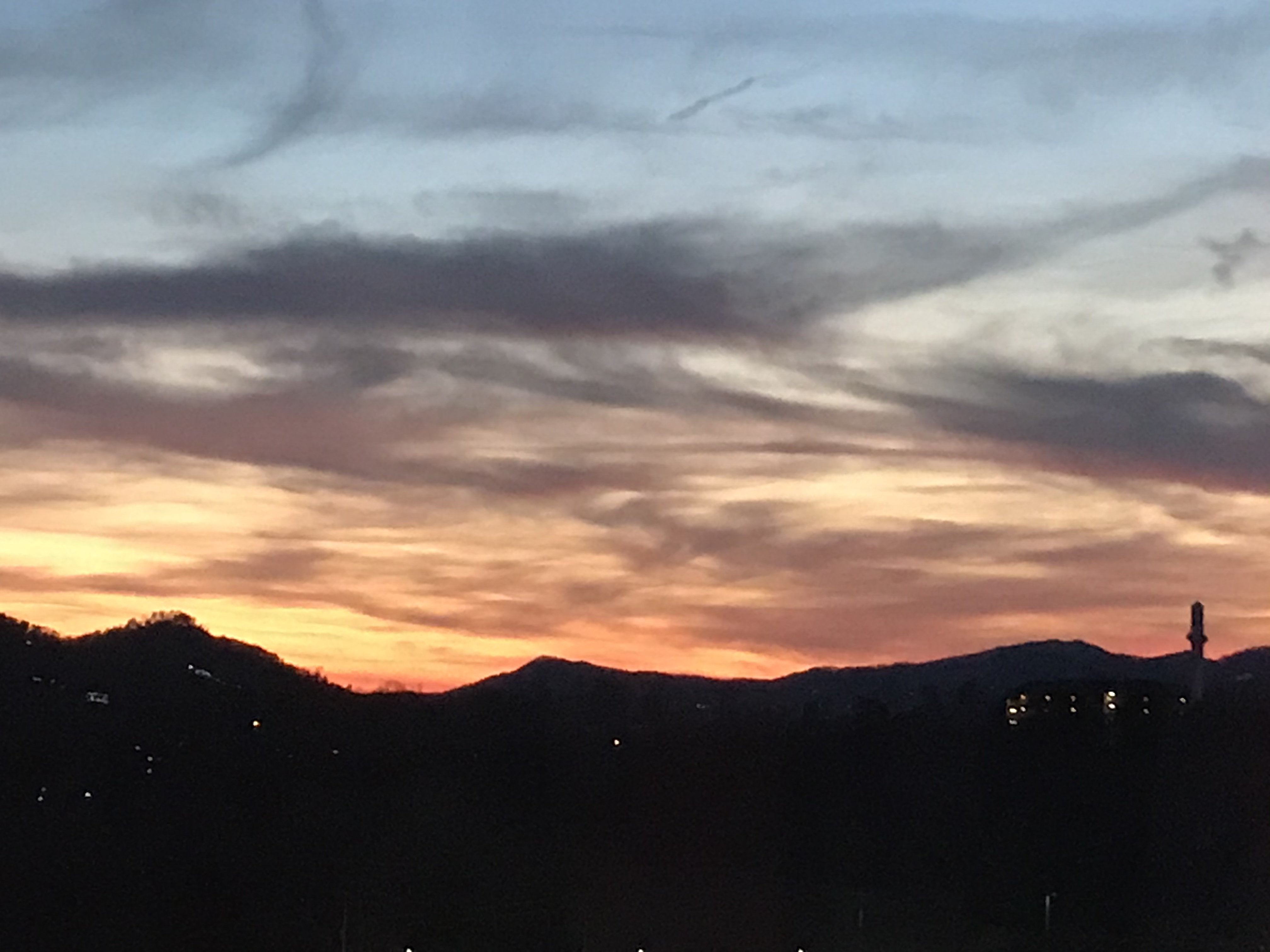 Sunset from the gondola on The Wheel, Pigeon Forge, Tennessee. Photo taken by and the property of FourWalls. Sunset from the gondola on The Wheel, Pigeon Forge, Tennessee. Photo taken by and the property of FourWalls.