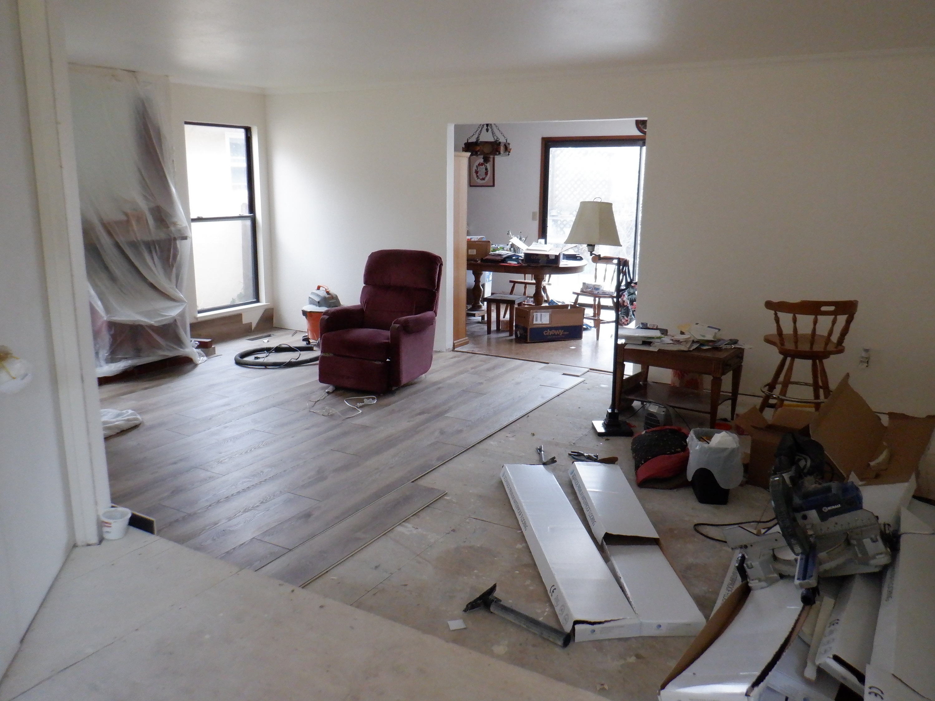 My brother laid some flooring in the living room My brother laid some flooring in the living room