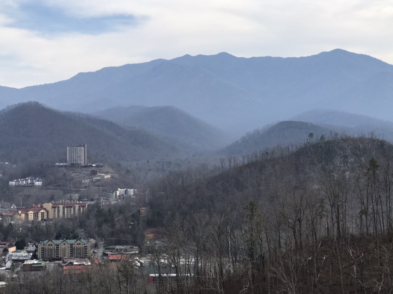 The Smokies and Gatlinburg from the Gatlinburg Bypass. Photo taken by and the property of FourWalls. The Smokies and Gatlinburg from the Gatlinburg Bypass. Photo taken by and the property of FourWalls.