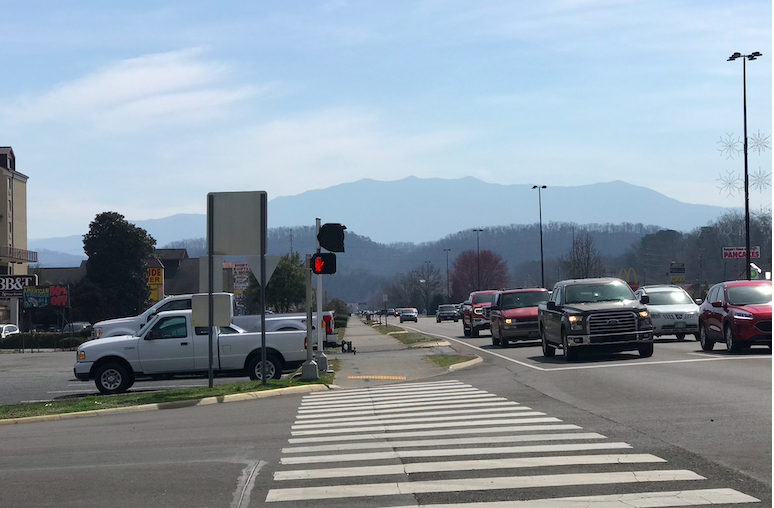 The Smokies in the background from Old Mill Drive in Pigeon Forge. Photo taken by and the property of FourWalls. The Smokies in the background from Old Mill Drive in Pigeon Forge. Photo taken by and the property of FourWalls.