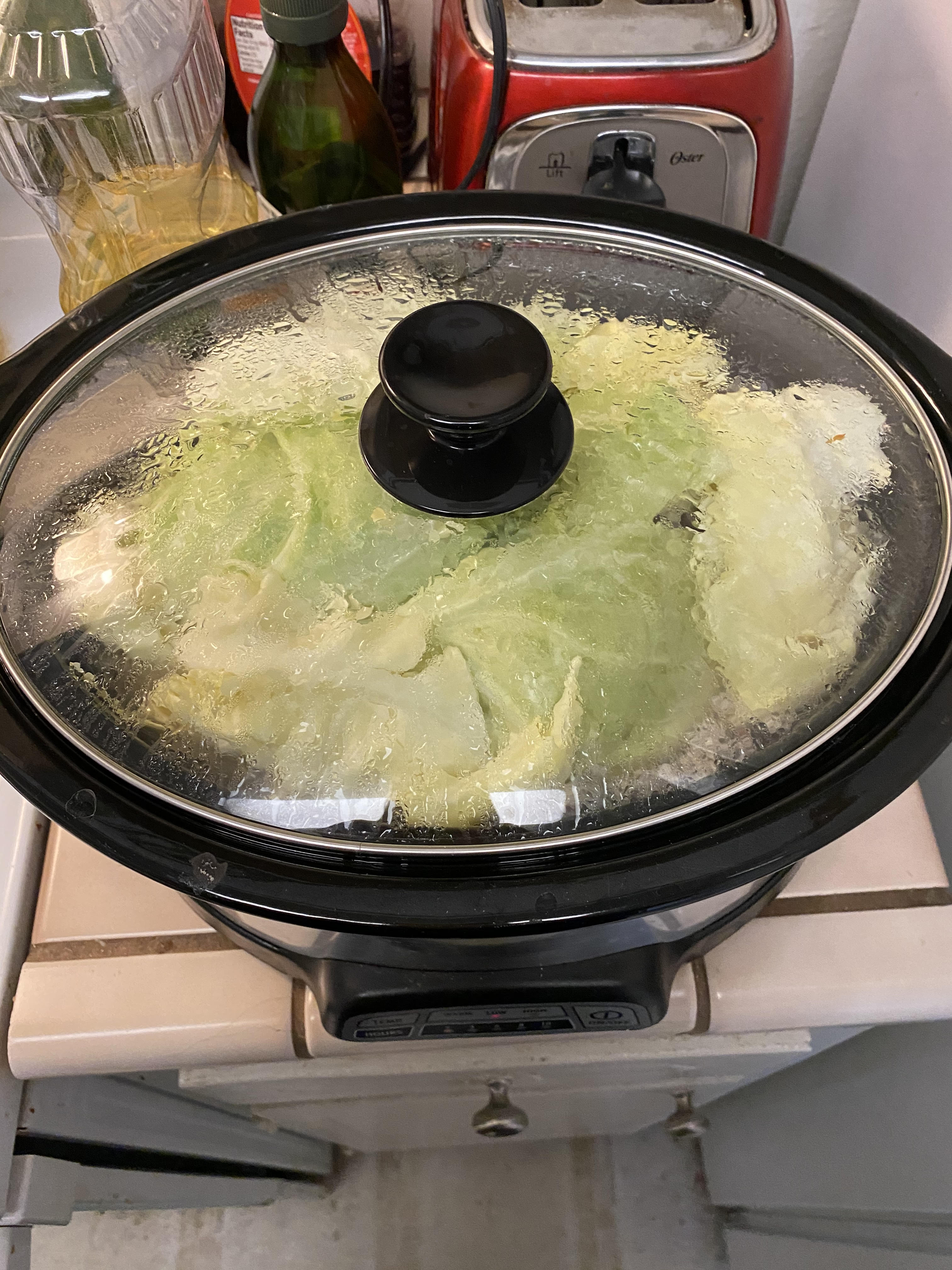 corned beef and cabbage cooking away in the slow cooker