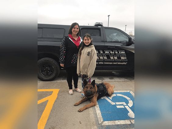 Izzy Greenfelder and her mom with Max the K9 dog Izzy Greenfelder and her mom with Max the K9 dog