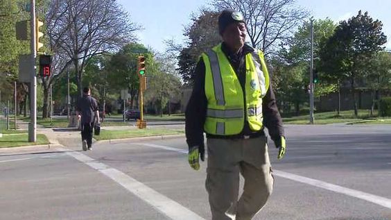 Milwaukee crossing guard Julius Campbell enjoying his work Milwaukee crossing guard Julius Campbell enjoying his work