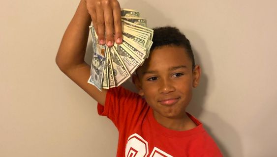 Landon Melvin showing his reward money of $1,000 dollars Landon Melvin showing his reward money of $1,000 dollars
