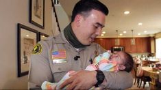 San Bernardino Sheriff's Department Deputy Joshua Kelly saving a child's life San Bernardino Sheriff's Department Deputy Joshua Kelly saving a child's life