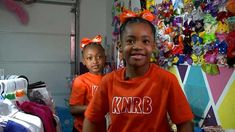 Khyla Phelps and her cousin Jeriya Haynie selling bows to customers Khyla Phelps and her cousin Jeriya Haynie selling bows to customers