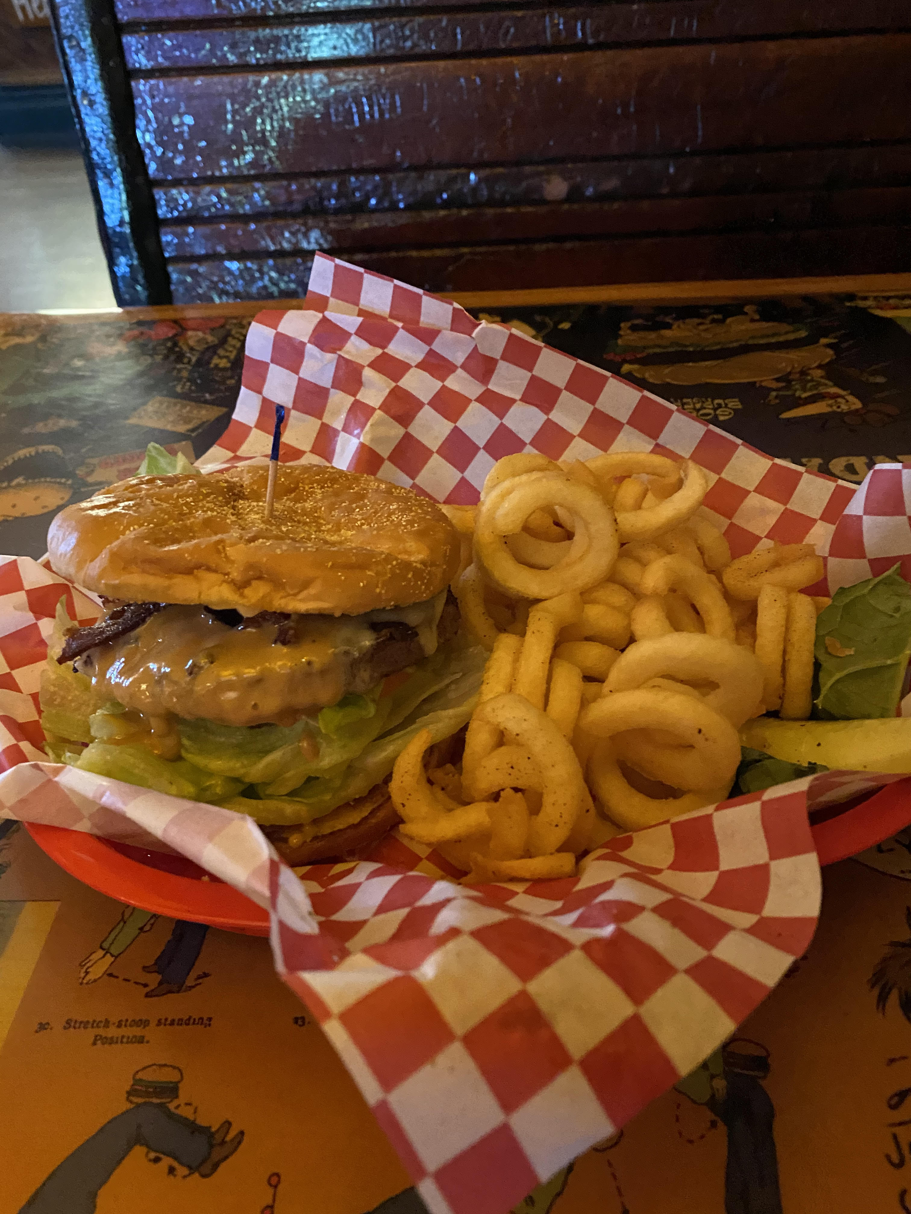 A scrumptious burger with peanut butter on it!