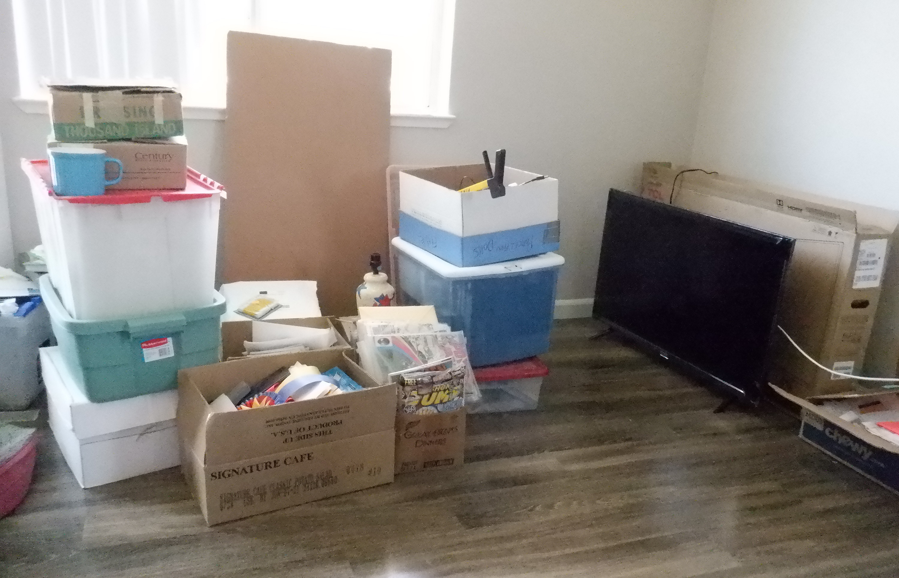 Photo I took of the boxes my brother and nephews brought and the TV that was set up. Photo I took of the boxes my brother and nephews brought and the TV that was set up.