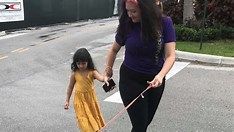 Mom of Hemily and her lost dog Binnie walking in the streets of Boca Raton Mom of Hemily and her lost dog Binnie walking in the streets of Boca Raton