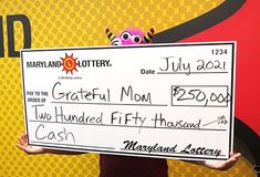 Grateful Mom showing her $250,000 check that she won last week Grateful Mom showing her $250,000 check that she won last week