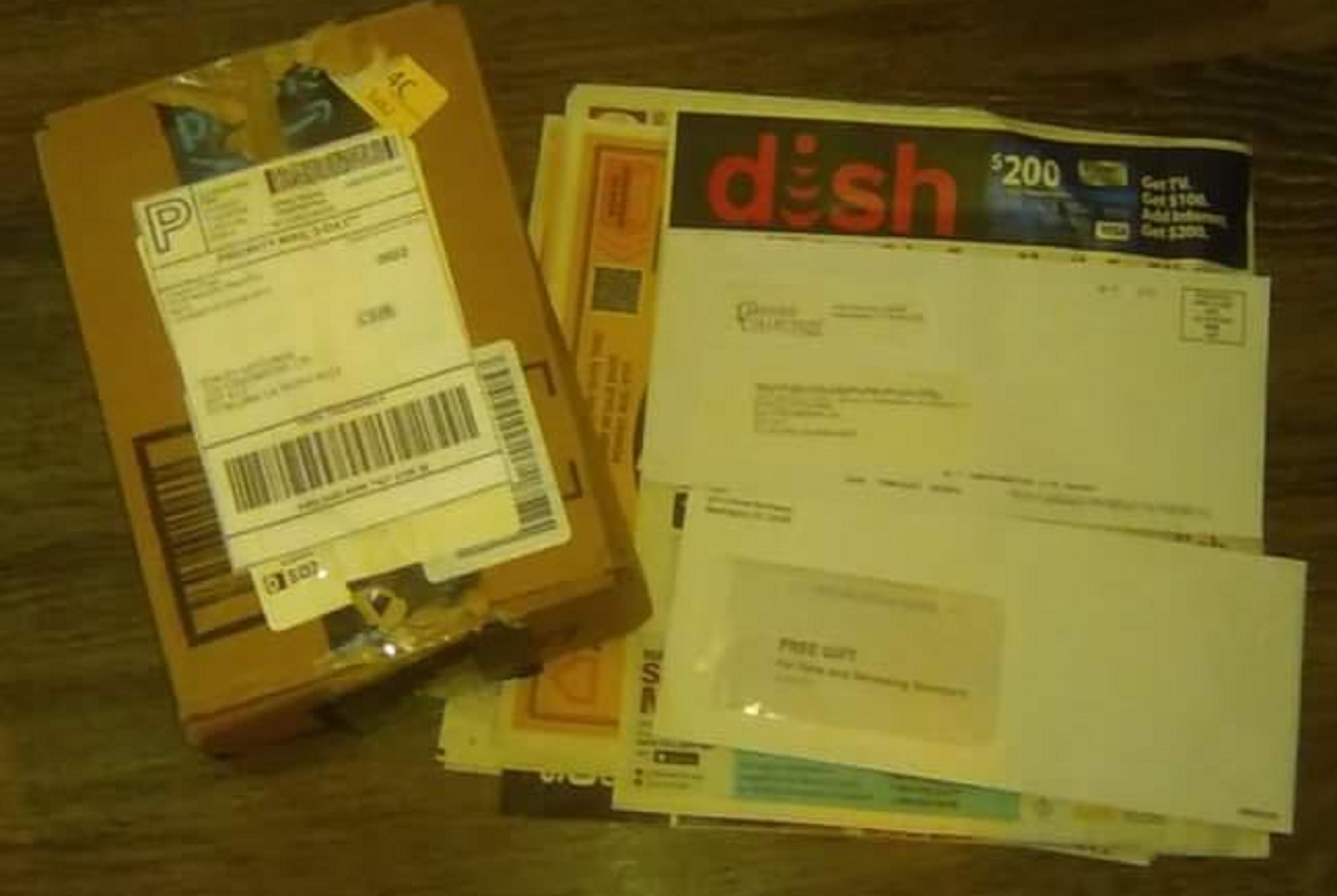 photo I took with my phone of the mail I got today--sorry it's yellow. photo I took with my phone of the mail I got today--sorry it's yellow.