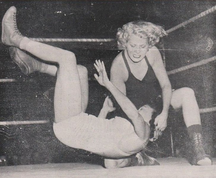 https://commons.wikimedia.org/wiki/File:When_the_girls_go_into_action,_the_hair_flies_-_28_February_1953_-_St.Paul_Armory_Wrestling_Program.jpg https://commons.wikimedia.org/wiki/File:When_the_girls_go_into_action,_the_hair_flies_-_28_February_1953_-_St.Paul_Armory_Wrestling_Program.jpg